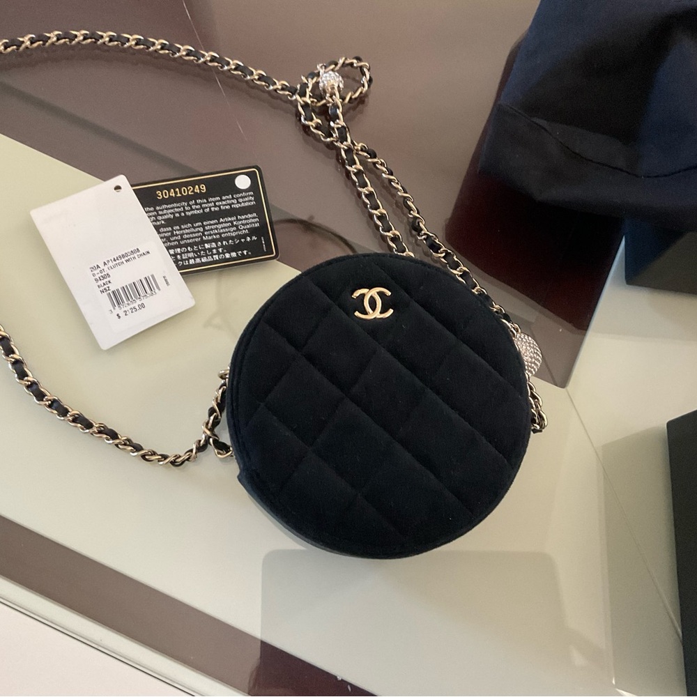 Chanel Black Quilted Mini Bag with Gold Accents